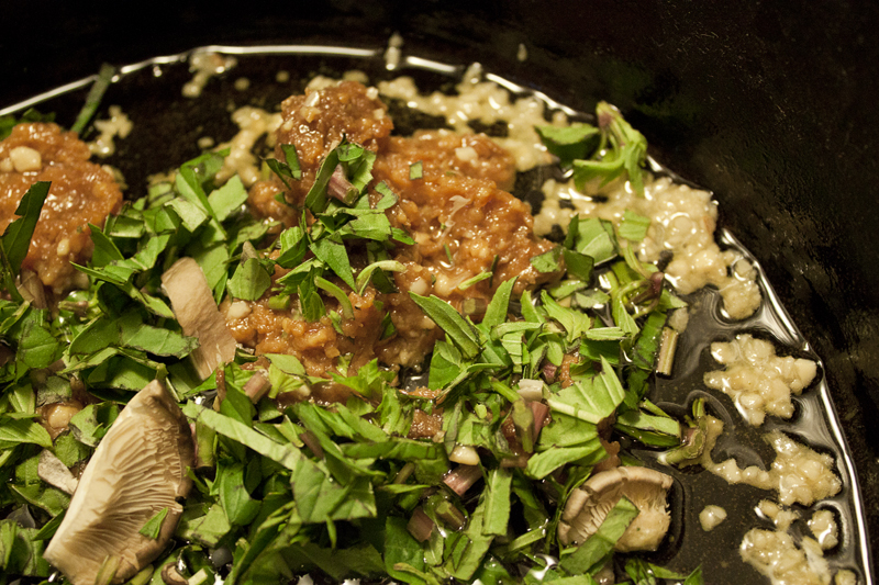Cooking begins with basil, mushrooms, and Miso paste